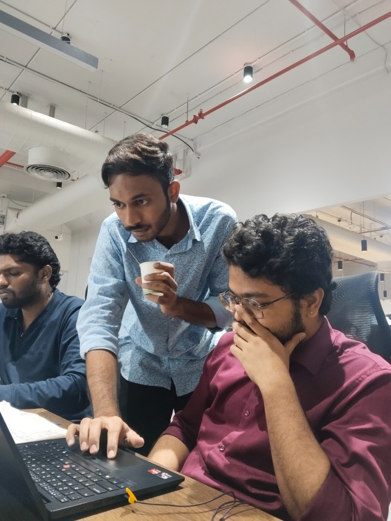 Colleagues collaborating at a desk