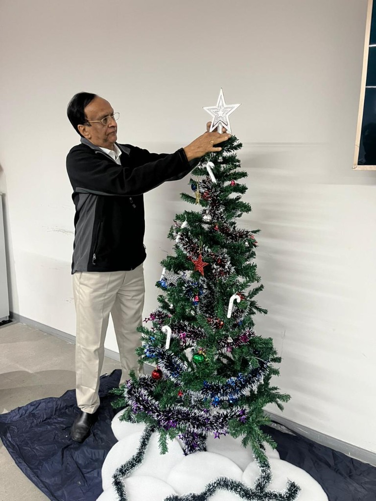 Decorating the office Christmas tree